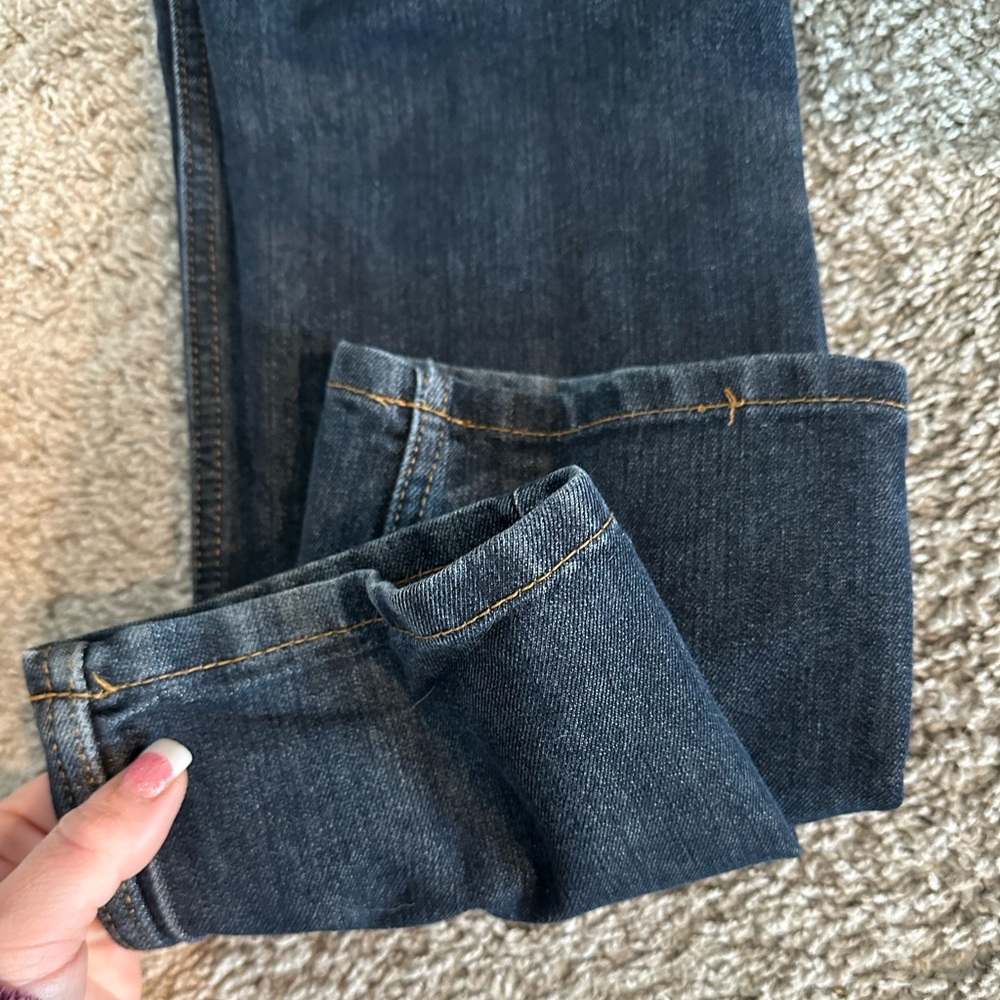 Gently used Pair of Levi's and Wrangler blue Jeans